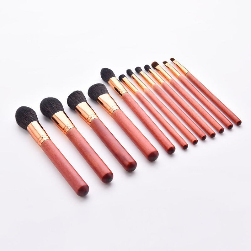 sustainable wood and bronze vegan makeup brushes
